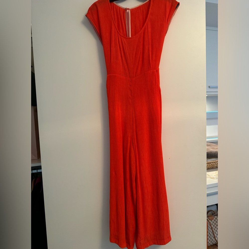 Anthropologies orange-red crepe jumpsuit